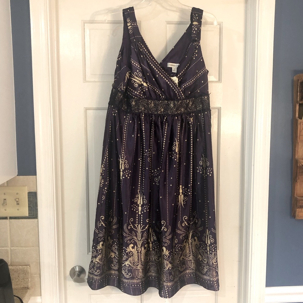 NWT, beautiful purple and gold, special occasion dress. Tea length, sleeveless.